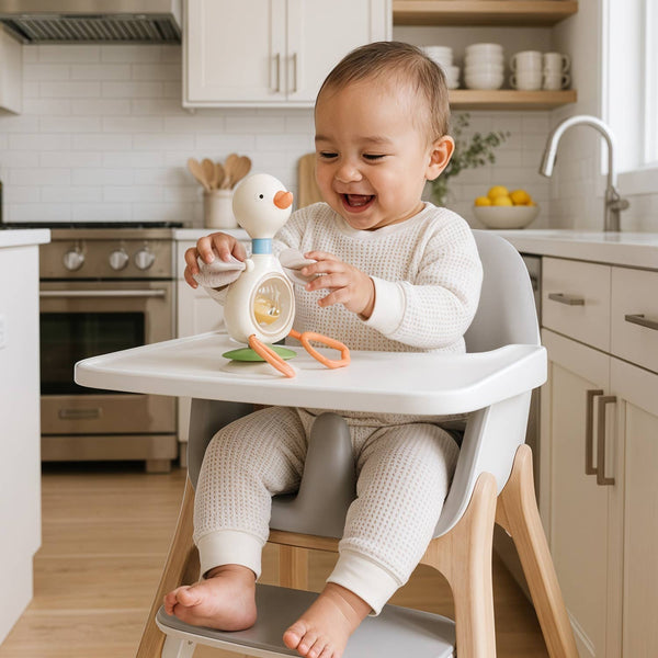 Itzy Twist & Bop™ | High Chair Sensory Toy Goose