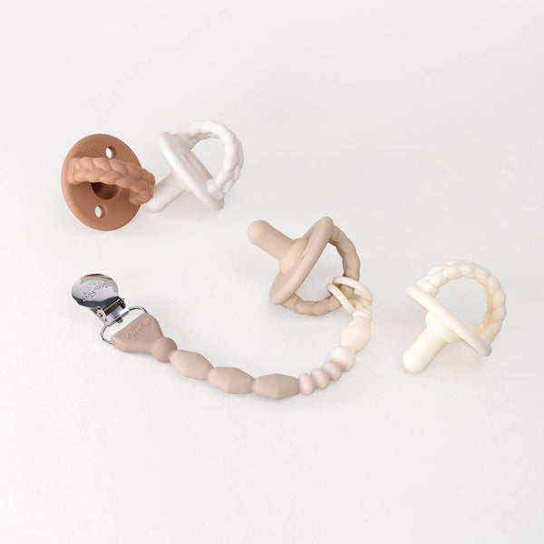 Itzy Paci Strap Plus™ | Pink Bows