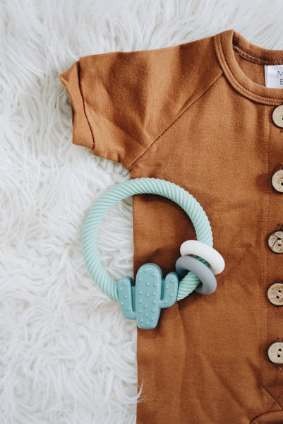 Ritzy Rattle™ Silicone Teether Rattles | Highland Cow